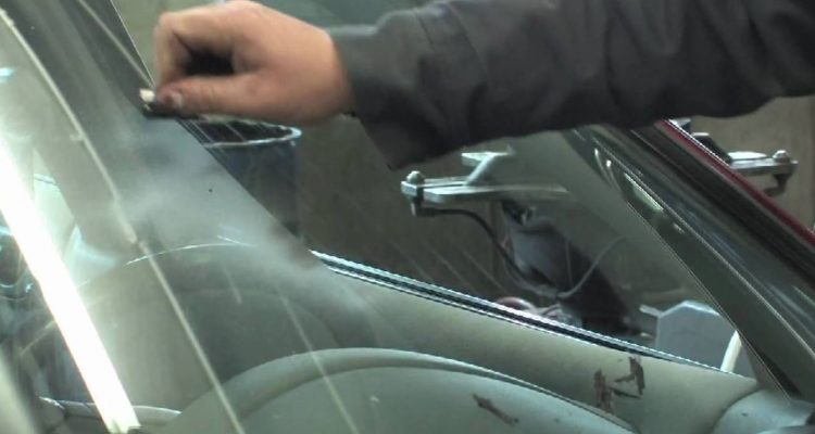 cleaning car windshield